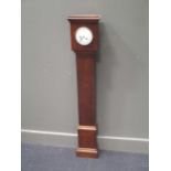 An oak grandmother clock with French movement (126cm high) and a miniature longcase timepiece ( 25cm