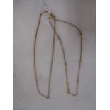 box chain and ball chain, both stamped '750' and tested as 18ct gold, gross weight 12.8g (2)