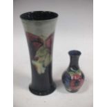 A Moorcroft Pansy pattern vase and another smaller (2)