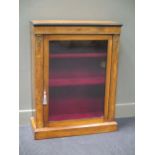 A Victorian inlaid walnut pier cabinet on plinth base 76cm wide