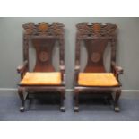 A pair of high back Chinese carved teak armchairs, mid 20th century, 130 x 67 x 55cm