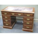 An Edwardian twin pedestal desk 120cm wide