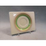 A Clarice Cliff Biarritz shape ashtray or card tray with green and brown banded design