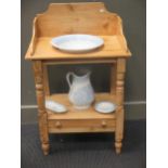 A stripped pine washstand with blue and white china wash set, 93 x 54 x 28cm