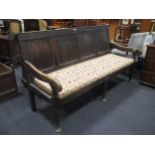 An 18th/ 19th century oak tavern settle on cabriole legs 185cm wide