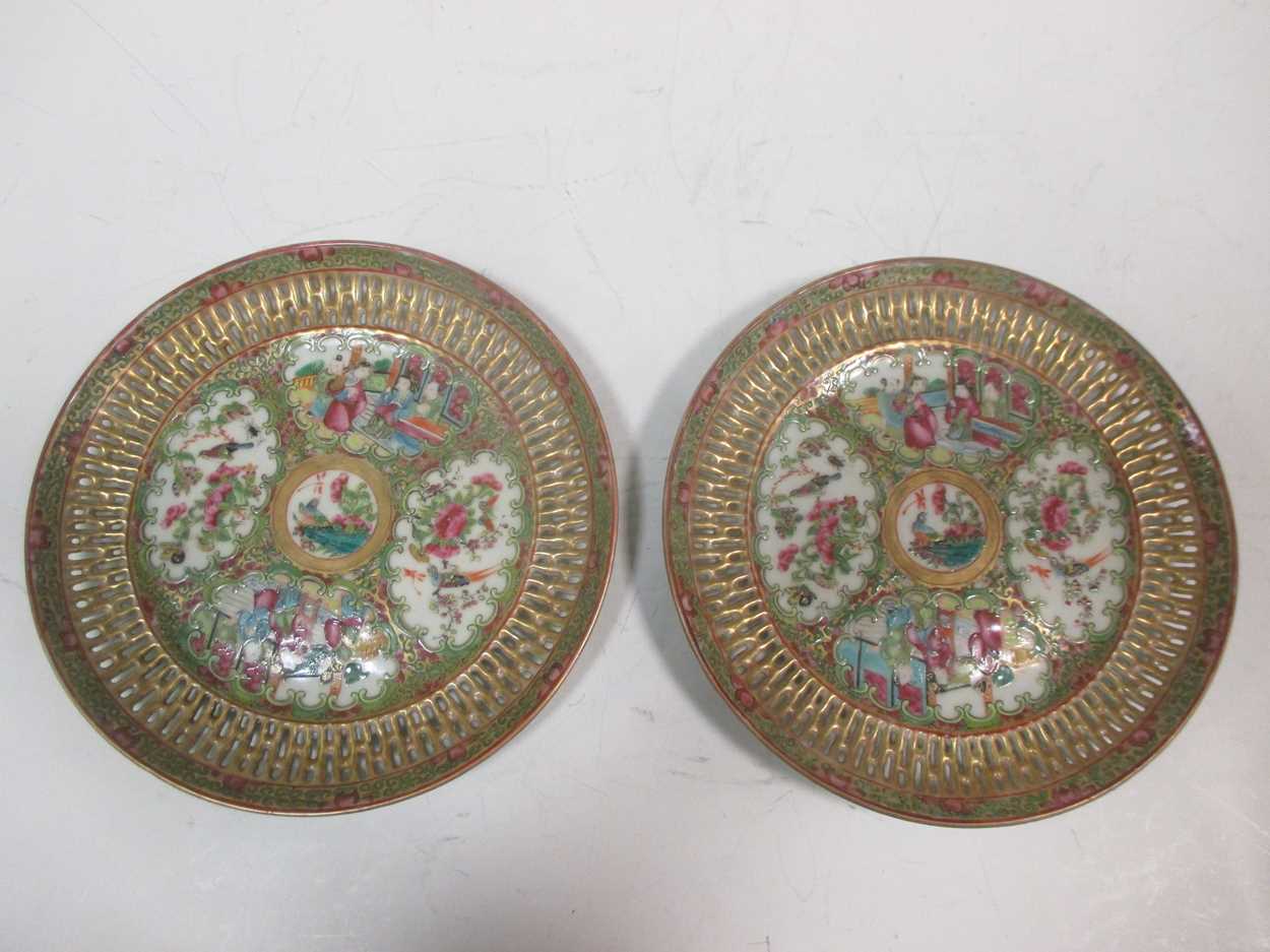 A pair of Chinese Cantonese export porcelain pierced plates