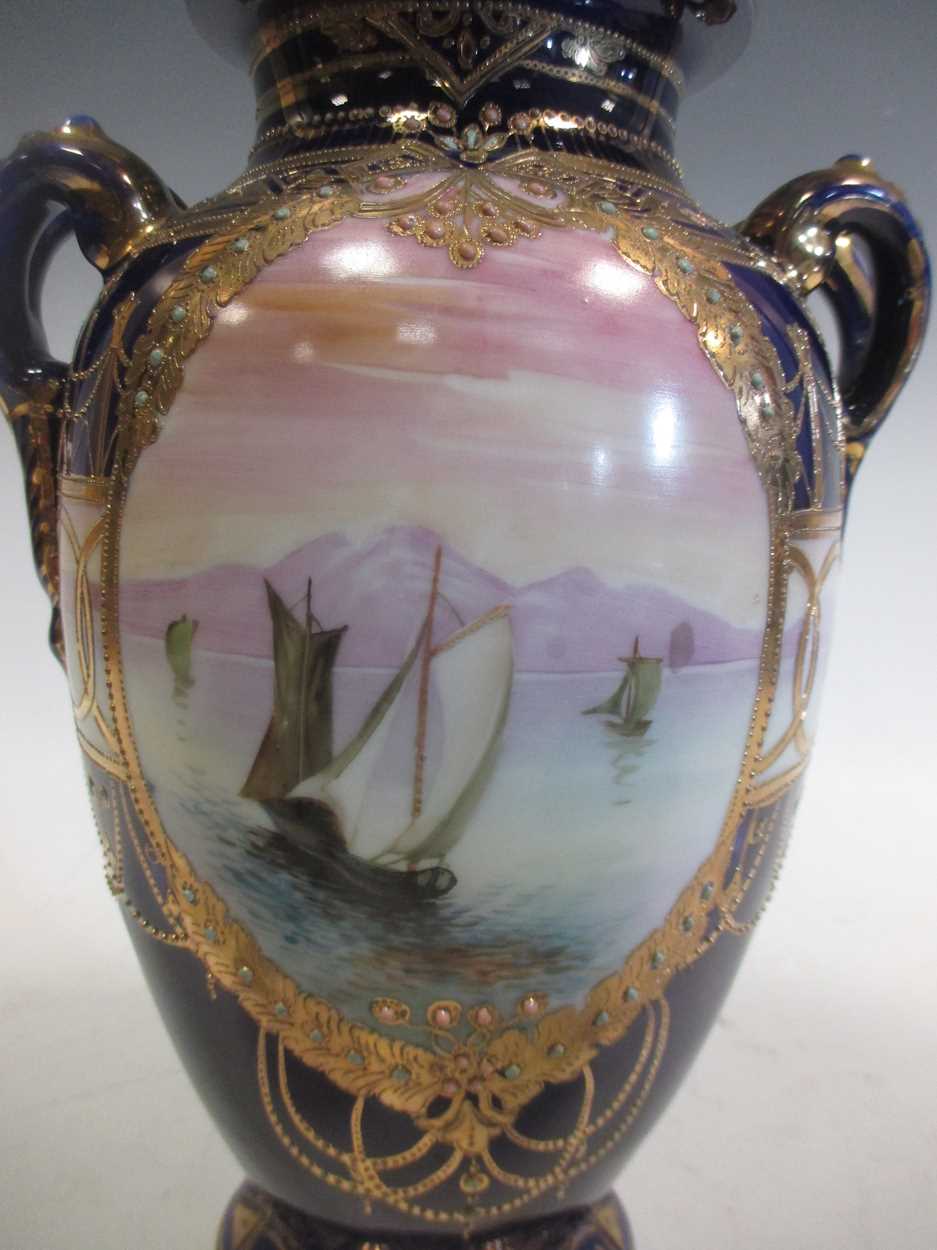 Three Noritake two-handled vases painted with sailing boats, reserved on blue ground bodies, the - Image 6 of 7