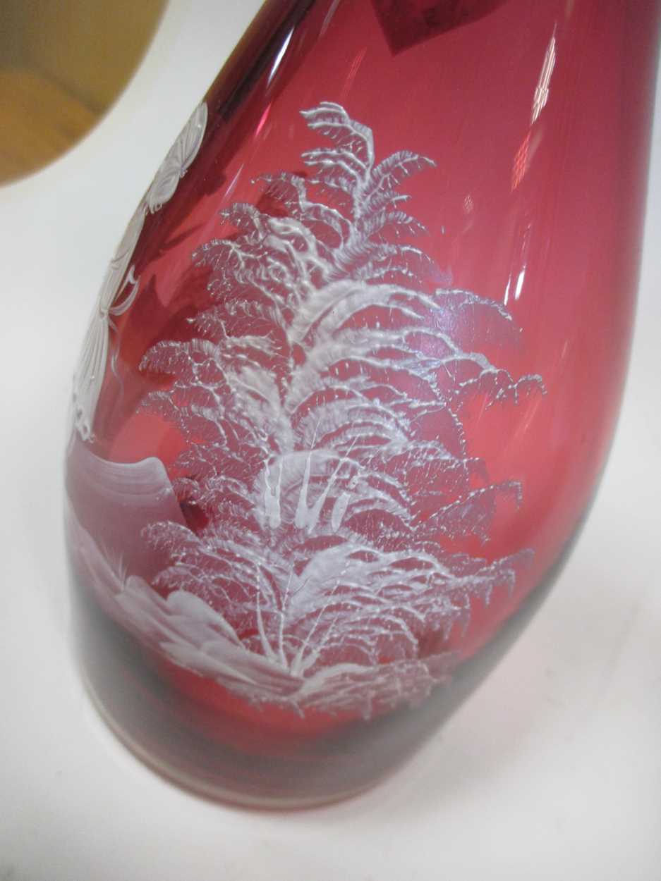 A pair of cranberry glass carafes painted with Mary Gregory style figures and a 'Marie Antoinette' - Image 6 of 7