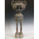 A German pottery jardiniere and stand, moulded and decorated in the Renaissance manner, 86cm high (