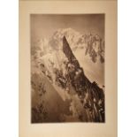 A large photograph, probably Mont Blanc,