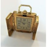 Türler, Zurich - A delightful 14ct gold travelling timepiece,