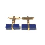 A pair of modern cufflinks set with lapis lazuli,