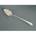A George III silver straining spoon,