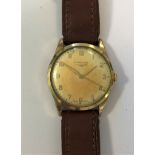 Longines - A gentleman's 9ct gold wristwatch,