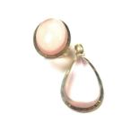 A rose quartz pendant and ring,