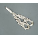 An unusual and heavy pair of Victorian silver grape scissors,