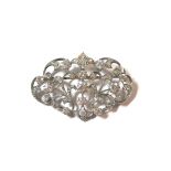 An Edwardian style diamond and cubic zirconia brooch,