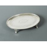 Newcastle - A George III silver teapot stand,