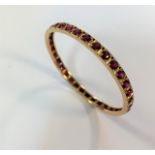 A continuous stone set bangle,