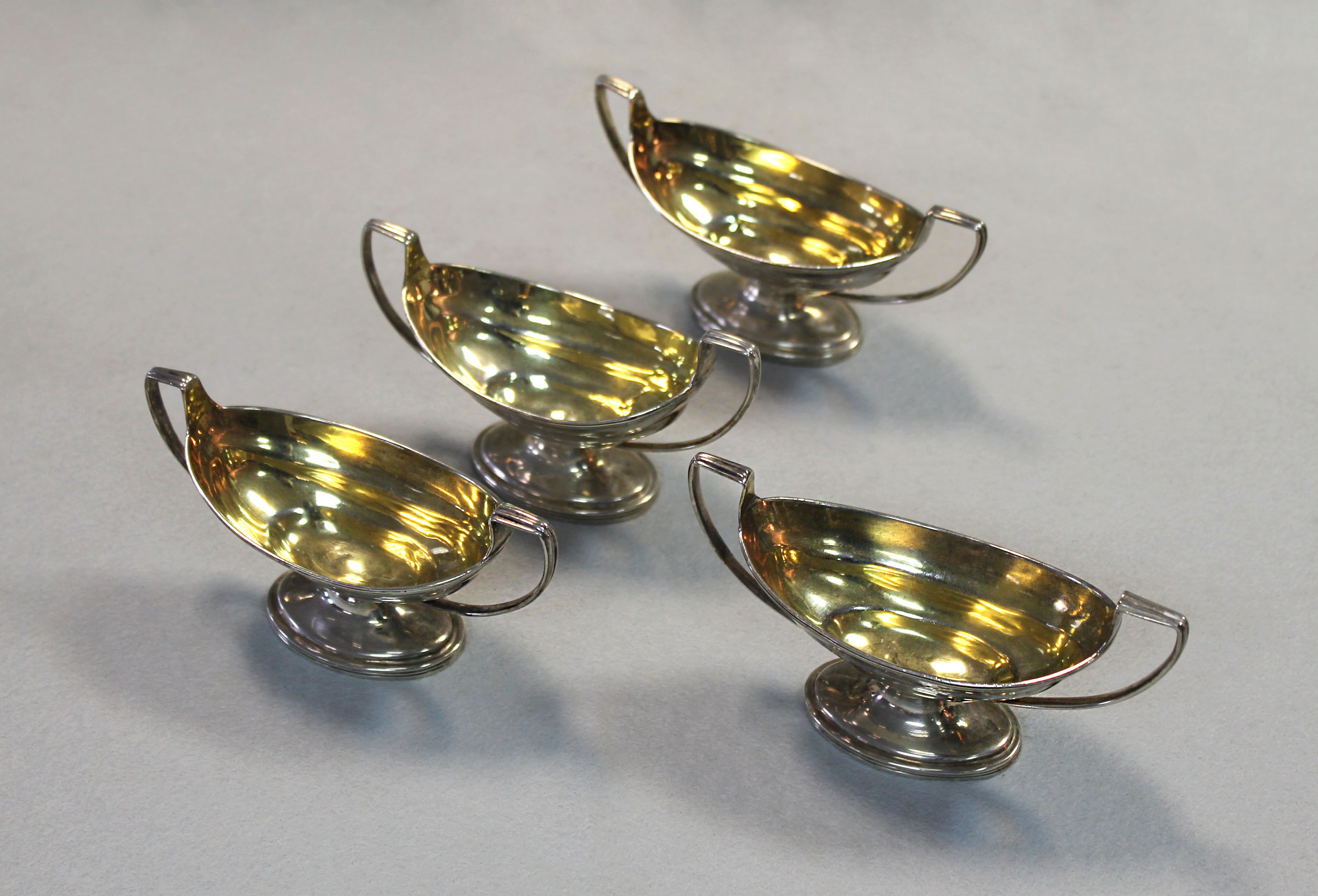 A set of four George III silver salts,