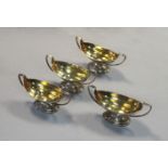 A set of four George III silver salts,