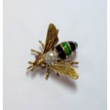 A ruby, diamond and enamel bee brooch / pendant,