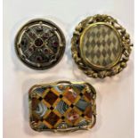 A trio of brooches in the Scottish style,