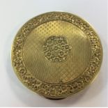 A small travelling powder compact marked '585',