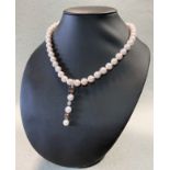 A cultured pearl, diamond and natural Fancy coloured diamond pendant necklace,