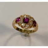 A late Victorian ruby and diamond cluster ring,
