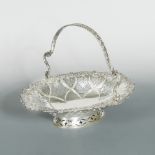 A Victorian silver swing handled cake basket,