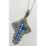 A large paste set cross and chain,