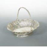 A George III silver swing handled bread basket,