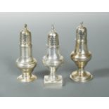 A collection of three George III silver spice casters,