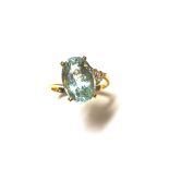 An aquamarine and diamond ring,