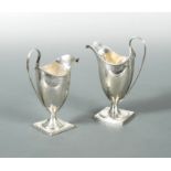 Two George III silver helmet cream jugs by Peter & Ann Bateman,