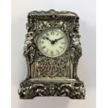 Aiguiller - A silver plated miniature carriage clock with original travelling case,