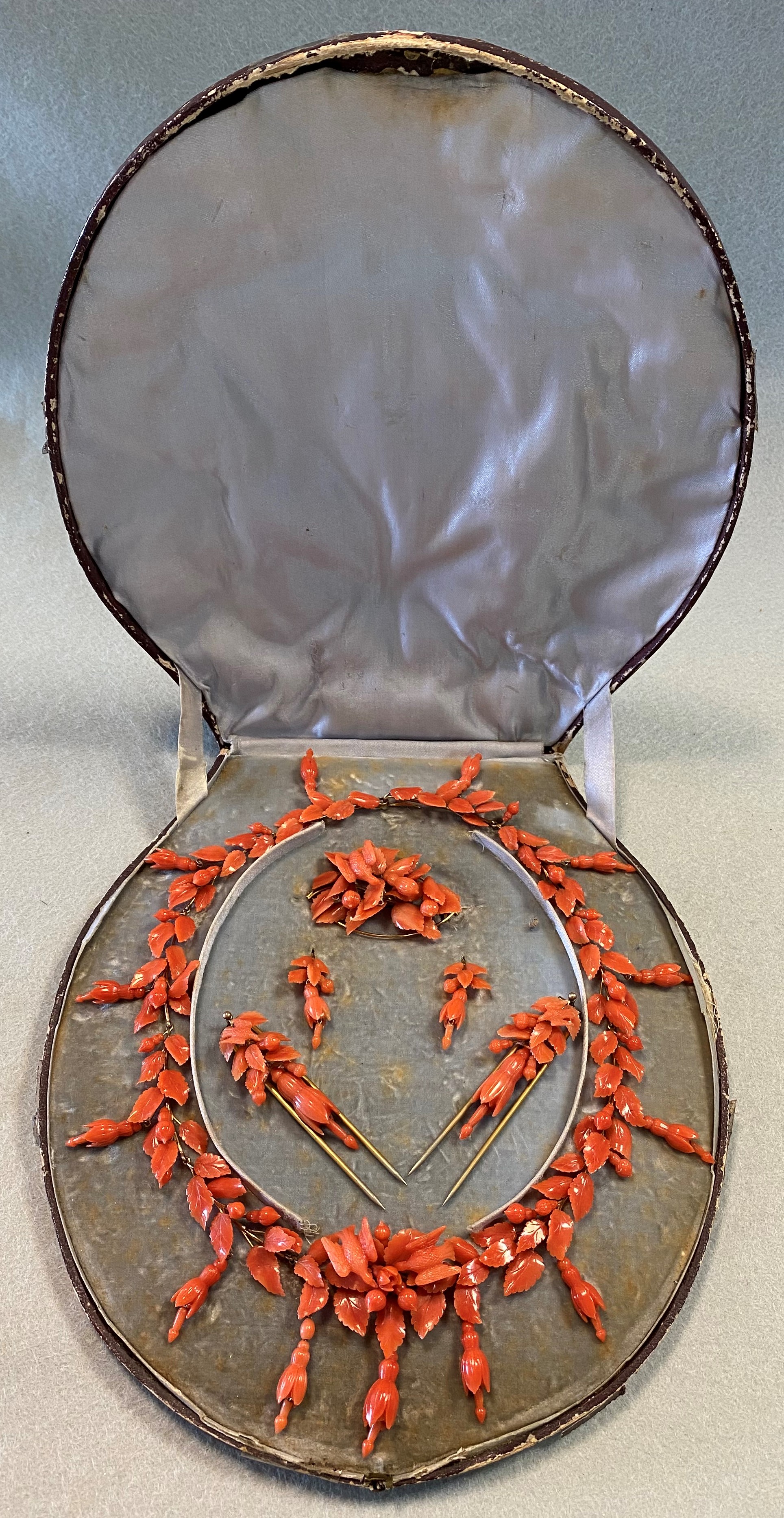 A suite of carved coral jewellery,