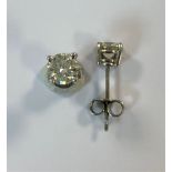 A pair of single stone diamond earstuds,