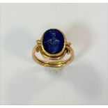 An intaglio seal ring of lapis lazuli,