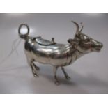 A continental metalwares cow creamer,