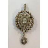 An impressive 19th Century diamond pendant / brooch,