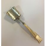 A Victorian silver shovel shaped caddy spoon,