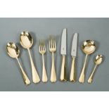 A canteen containing an 84 piece set of 21st Century silver gilt cutlery and flatware,