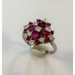 A modern ruby & diamond cluster ring,