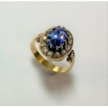 A late 19th Century sapphire and diamond cluster ring,