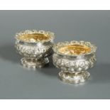 A pair of George IV silver cauldron salts,