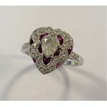 A Victorian style ruby and diamond heart shaped cluster ring,