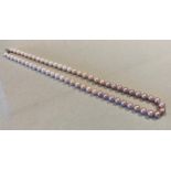 A row of Edison Freshwater cultured pearls of graduating colour and exceptional size,