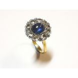 A star sapphire and diamond cluster ring,